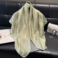Elegant light green silk scarf with metallic shimmer and geometric star pattern - 90x90cm / Matcha Green