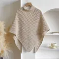Detail of beige hollow knit sunscreen shawl with intricate crochet diamond patterns - Khaki