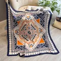 90cm faux silk square scarf featuring navy paisley pattern and orange accents - Blue