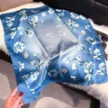 Blue gradient square silk scarf with elegant floral patterns on a white plush surface - 70fj-380 Blue / 70*70cm