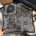 Retro paisley print square silk scarf in black and white finish laid on leather - 70fj-443-black / 70*70