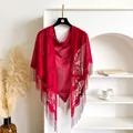 Elegant red lace triangle shawl with floral cutout patterns and fringe tassels - Red