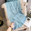 Light blue pleated sheer scarf with dark blue polka dots draped on a chair - 110x40cm / Sky Blue Polka Dot