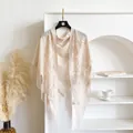 Elegant beige lace triangle shawl with floral hollow design and long tassels hanging - Beige