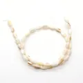 Cuentas de nácar natural en forma de arroz blanco con brillo irisado para joyas DIY - 5x8-6x9mm / Blanco Crema (N°11)