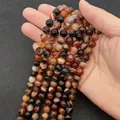 Strand of polished natural banded agate round beads with colorful stripe patterns - 6mm / Banded Orange Red (No. 4)