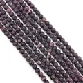Close-up of natural dragon vein agate round beads with black and pink crackle texture - Small / Black Pink Crackle