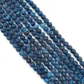 Macro shot of blue dragon vein agate round beads showing unique black mesh textures - Small / Blue Gradient Crackle