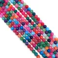 Macro shot of colorful matte dragon vein agate beads with detailed cracked texture - No.2 Rainbow Mix / 6mm
