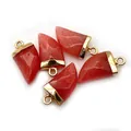 Macro view of five red faceted stone horn pendants with elegant gold caps and rings - Watermelon Quartz