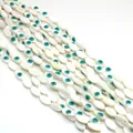 Marquise cut natural mother of pearl shell beads with turquoise evil eye pattern - 5x10mm / Green