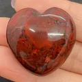 Polished heart-shaped natural red jasper stone held in hand for jewelry making - 30x30mm, 14mm Thickness / Red Jasper Texture (No.7)