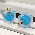 Blue ball inside transparent acrylic cube pendant with golden metal loop ring - 12x18mm / Sky Blue