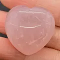 Handheld heart-shaped natural rose quartz stone with translucent pink texture and cracks - 30x30mm, 14mm Thickness / Rose Quartz