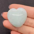 Polished light blue heart-shaped natural stone bead held in palm for DIY jewelry - 30x30mm, 14mm Thickness / Light Blue Stone (17)