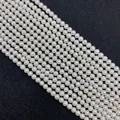 Hilos de perlas blancas naturales de agua dulce con forma redonda y brillo intenso - 2-3mm / Grado AAA