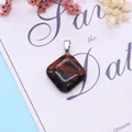 Polished rhombus tiger eye stone pendant with silver bail on a decorative card - Swan Stone (24x28mm) / Swan Stone
