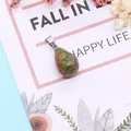 Faceted unakite water drop stone pendant with silver clasp on decorative floral card - 13x23mm / Unakite