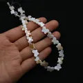 Makroaufnahme von irisierenden Schmetterlingsperlen aus Perlmutt für DIY-Schmuck - Horizontales Loch Schmetterlingsform / 8x12mm (1 Schnur)
