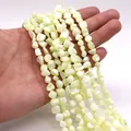Cuentas de nácar natural irregulares en crema amarillento para hacer bisutería - No.10 (Amarillo Pálido)