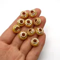 Makroaufnahme von Schachbrettperlen aus Muschel mit Roségold-Metallkern - Gelbes Mosaik Roségoldkern (Stil 3)