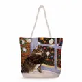 Detail of white cotton rope handles on a festive Christmas cat canvas beach tote bag - Christmas Window Tabby Cat (ms2863)