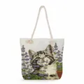 Close-up of canvas tote bag featuring cat and lavender print with cotton rope handles - Lavender Tabby Kitten (ms2877)