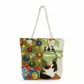 Detail of canvas tote bag featuring Christmas cat print and thick cotton rope handles - Black And White Cat Under Christmas Tree (ms2883)