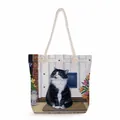 Floral cat printed canvas tote bag with thick cotton rope handles for beach and daily use - Black White Cat At Door Flower Cluster (ms2895)