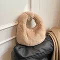Apricot faux fur dumpling bag with knot handle and plush texture for winter style - Khaki