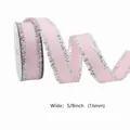Roll of 16mm pink double-faced satin ribbon with shimmering silver metallic edges - Silver Edge Decorative Ribbon / Pink