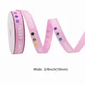 Pink Christmas ribbon 10mm width with Merry Christmas text and colorful glitter dots - Christmas Decorative Ribbon Style / Pink
