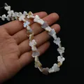 Perles papillon en nacre naturelle pour création de bijoux DIY avec reflets irisés - Forme Papillon Trou Vertical