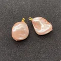Coppia di pendenti in perle barocche rosa chiaro a forma di dente con anelli oro - Rosa