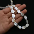 Perles naturelles en nacre blanche en forme de main de Fatma pour la création de bijoux - Petite Empreinte De Main