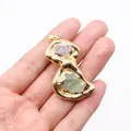 Detailed close-up of a golden female torso pendant with natural amethyst and green stones - No. 4 Single Color 50 Pieces/pack / 25-60mm,16-18g
