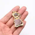 Close-up of natural purple raw stone pendant in a gold-plated figure-8 frame on a hand - No. 5 Single Color 50 Pieces/pack / 25-60mm,16-18g