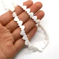 Natürliche weiße Perlmuttherz-Muschelperlen für die DIY-Schmuckherstellung - Herzform mit horizontalem Loch