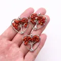 Handheld heart-shaped Tree of Life pendant with red crushed stones and silver wire wrap - Rainbow Stone