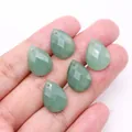 Macro shot of five faceted green aventurine teardrop charms for DIY jewelry making - 13x18mm / Green Aventurine