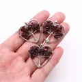 Three heart-shaped tree of life pendants featuring red natural stones and silver wire wrap - Garnet