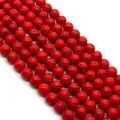 Fili di perle tonde in turchese rosso lucido con matrice nera per la creazione di gioielli - Rosso