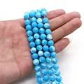 Close-up of bright blue marble stone beads being held by hand for DIY jewelry making - 4mm Specification / Marble Blue (Style 2)
