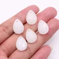 Faceted rose quartz water drop pendants held in hand for DIY necklace making - 13x18mm / White Jade