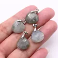 Faceted teardrop labradorescent gemstone pendants held by hand for jewelry DIY - 16x17mm / Flash Stone (Labradorite)