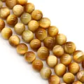Polished natural yellow tiger eye round beads showing silk luster and chatoyancy bands - Yellow (No.6)
