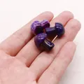 Three purple mushroom-shaped dragon vein agate beads held by hand for DIY jewelry making - Polished Mushroom Loose Bead / Purple (No.1)
