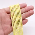 Tira de cuentas de turquesa amarillo pálido en forma de cubo facetado para joyería DIY - 2.5x2.5mm / Amarillo claro