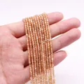 Strands of amber cubic crystal spacer beads for DIY jewelry making with iridescent finish - No. 4 (Amber Aurora)
