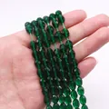 Donkergroene gefacetteerde ovale kattenoog steenkralen voor DIY sieraden en kettingen - Donkergroen